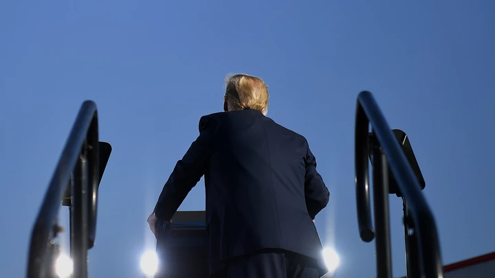 US President Donald Trump speak during a rally at Tucson International Airport in Tucson, Arizona on October 19, 2020. - US President Donald Trump went after top government scientist Anthony Fauci in a call with campaign staffers on October 19, 2020, suggesting the hugely respected and popular doctor was an "idiot." (Photo by MANDEL NGAN / AFP) (Photo by MANDEL NGAN/AFP via Getty Images) US President Donald Trump speak during a rally at Tucson International Airport in Tucson, Arizona on October 19, 2020. - US President Donald Trump went after top government scientist Anthony Fauci in a call with campaign staffers on October 19, 2020, suggesting the hugely respected and popular doctor was an "idiot." (Photo by MANDEL NGAN / AFP) (Photo by MANDEL NGAN/AFP via Getty Images)