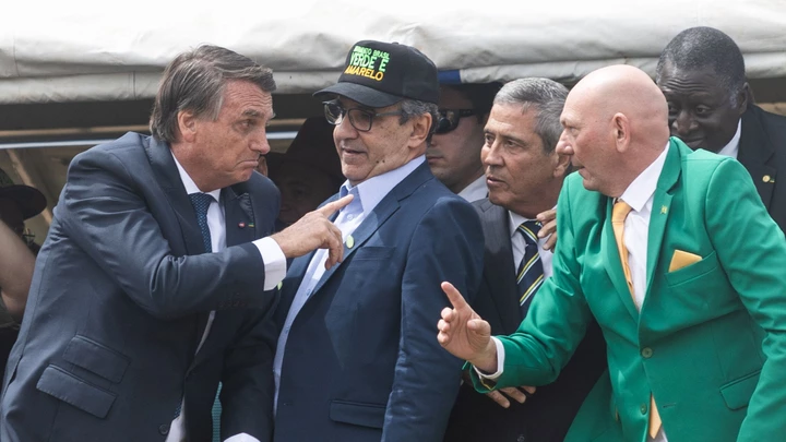 Jair Bolsonaro, Brazil's president, center left, during an Independence Day military parade in Brasilia, Brazil, on Wednesday, Sept. 7, 2022. Around 10,000 police officers have been deployed to prevent riots in Brasilia, where Bolsonaro supporters will hold pro-government rallies following an Independence Day military parade. Photographer: Arthur Menescal/Bloomberg via Getty Images