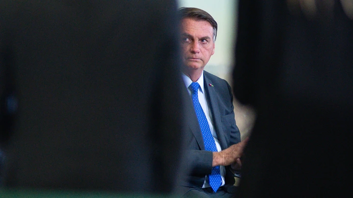 Jair Bolsonaro, Brazil's president, during the launch event of the Banco do Brasil SA Agro Investment Program at Planalto Palace in Brasilia, Brazil, on Tuesday, Aug. 24, 2021. Bolsonaro is growing uneasy about Brazils inflation in the run-up to general elections next year, but his complaints about rising prices dont mean he plans to interfere with the central bank, according to five people close to him including cabinet members. Photographer: Andressa Anholete/Bloomberg via Getty Images Jair Bolsonaro, Brazil's president, during the launch event of the Banco do Brasil SA Agro Investment Program at Planalto Palace in Brasilia, Brazil, on Tuesday, Aug. 24, 2021. Bolsonaro is growing uneasy about Brazils inflation in the run-up to general elections next year, but his complaints about rising prices dont mean he plans to interfere with the central bank, according to five people close to him including cabinet members. Photographer: Andressa Anholete/Bloomberg via Getty Images