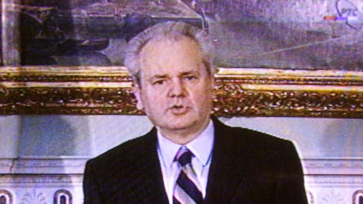 Yugoslav President Slobodan Milosevic delivers March 24 a nationwide television address. Milosevic said his government was right to reject foreign troops in Kosovo and urged Yugoslavs to stand firm against possible NATO air strikes.RS//ME - RTRN932 Yugoslav President Slobodan Milosevic delivers March 24 a nationwide television address. Milosevic said his government was right to reject foreign troops in Kosovo and urged Yugoslavs to stand firm against possible NATO air strikes.RS//ME - RTRN932