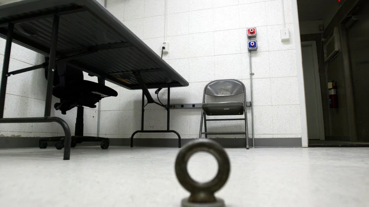 GUANTANAMO BAY, CUBA - APRIL 7:  An interrogation room in Camp Delta for detainees from the U.S. war in Afghanistan is shown April 7, 2004 in Guantanamo Bay, Cuba. On April 20, the U.S. Supreme Court is expected to consider whether the detainees can ask U.S. courts to review their cases. Approximately 600 prisoners from the U.S. war in Afghanistan remain in detention.  (Photo by Joe Raedle/Getty Images) GUANTANAMO BAY, CUBA - APRIL 7:  An interrogation room in Camp Delta for detainees from the U.S. war in Afghanistan is shown April 7, 2004 in Guantanamo Bay, Cuba. On April 20, the U.S. Supreme Court is expected to consider whether the detainees can ask U.S. courts to review their cases. Approximately 600 prisoners from the U.S. war in Afghanistan remain in detention.  (Photo by Joe Raedle/Getty Images)