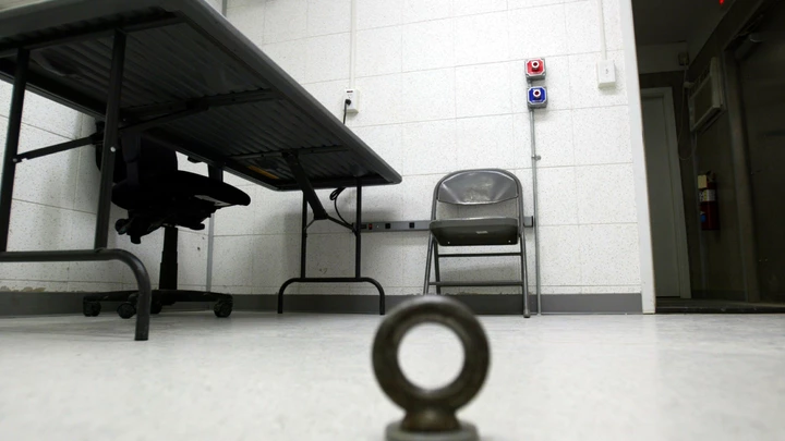 GUANTANAMO BAY, CUBA - APRIL 7:  An interrogation room in Camp Delta for detainees from the U.S. war in Afghanistan is shown April 7, 2004 in Guantanamo Bay, Cuba. On April 20, the U.S. Supreme Court is expected to consider whether the detainees can ask U.S. courts to review their cases. Approximately 600 prisoners from the U.S. war in Afghanistan remain in detention.  (Photo by Joe Raedle/Getty Images)