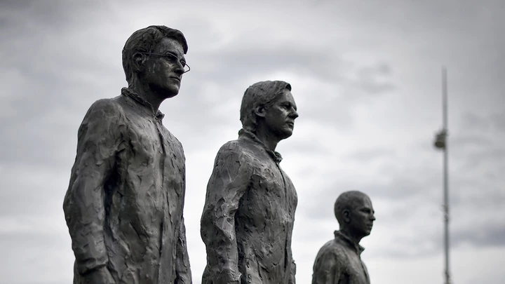 A picture of the installation "Anything to Say?", a bronze sculpture and art installation by Italian sculptor Davide Dormino representing whistleblowers (from L) Edward Snowden, Julian Assange and Chelsea Manning is seen on the Place des Nations next to the United Nations Offices in Geneva, on September 15, 2015.  AFP PHOTO / FABRICE COFFRINI
-- RESTRICTED TO EDITORIAL USE, MANDATORY MENTION OF THE ARTIST UPON PUBLICATION, TO ILLUSTRATE THE EVENT AS SPECIFIED IN THE CAPTION --        (Photo credit should read FABRICE COFFRINI/AFP/Getty Images) A picture of the installation "Anything to Say?", a bronze sculpture and art installation by Italian sculptor Davide Dormino representing whistleblowers (from L) Edward Snowden, Julian Assange and Chelsea Manning is seen on the Place des Nations next to the United Nations Offices in Geneva, on September 15, 2015.  AFP PHOTO / FABRICE COFFRINI
-- RESTRICTED TO EDITORIAL USE, MANDATORY MENTION OF THE ARTIST UPON PUBLICATION, TO ILLUSTRATE THE EVENT AS SPECIFIED IN THE CAPTION --        (Photo credit should read FABRICE COFFRINI/AFP/Getty Images)